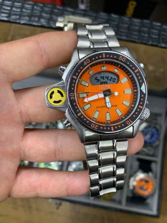 Relógio Citizen Aqualand Laranja P/Aço Série Ouro- A prova dágua (100% Funcional) c/caixa premium